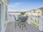Balcony off the master bedroom offers harbor views